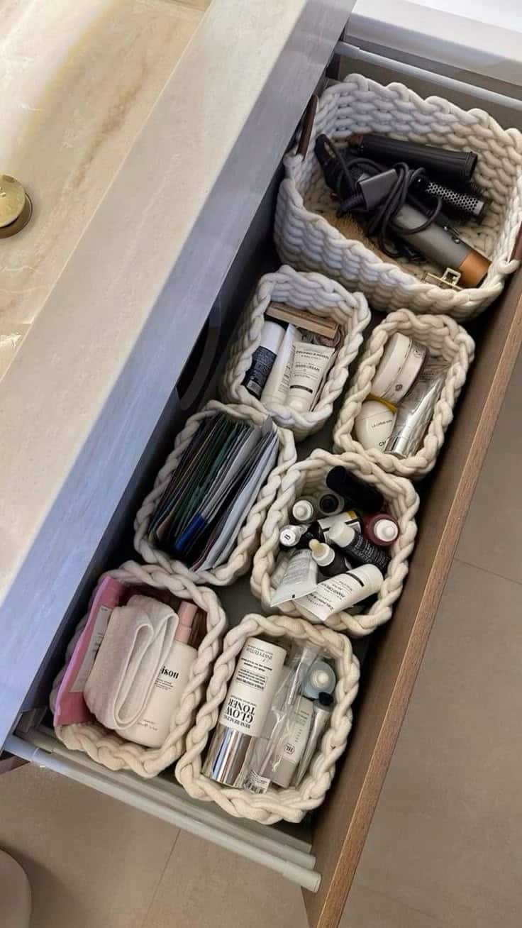 organisation 🤍 Bathroom drawer organized with skincare products in woven baskets for neat storage. | Sky Rye Design Bathroom drawer organized with skincare products in woven baskets for neat storage.