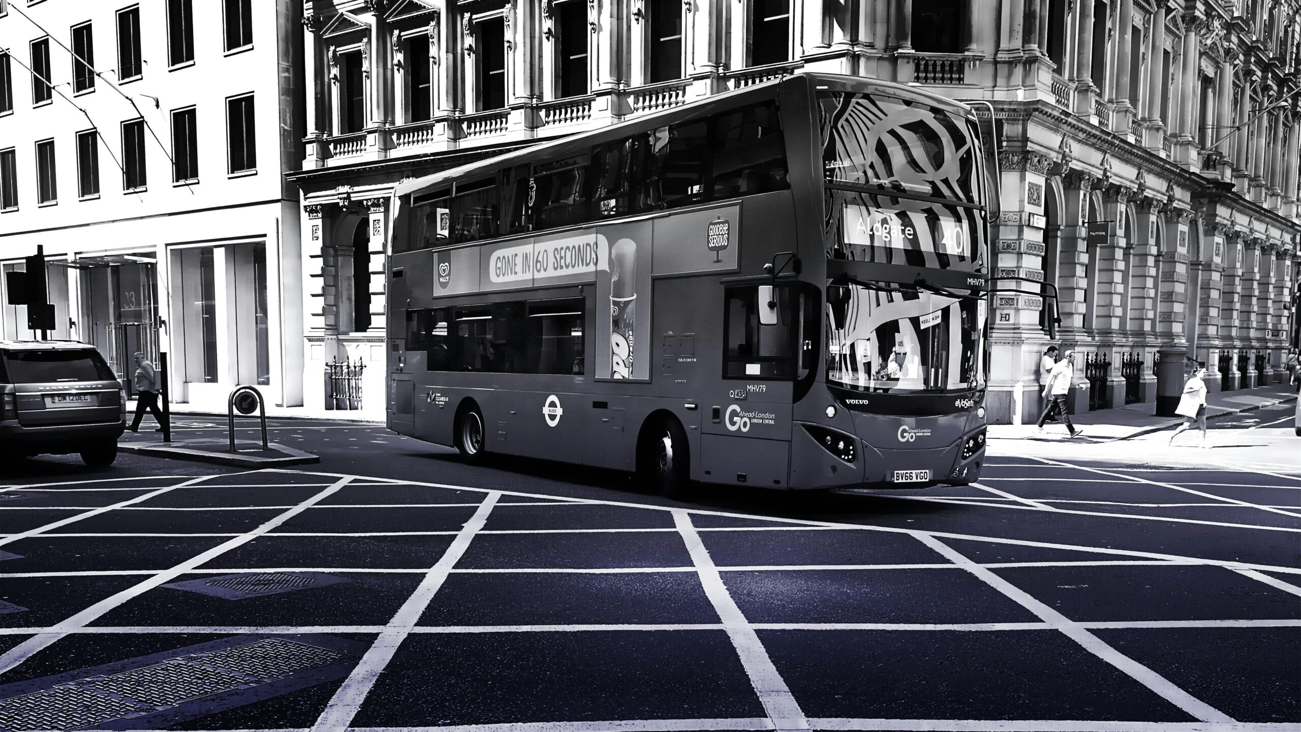 pexels-sevenstormphotography-590062 Double-decker bus on a London street with historic architecture and zebra crossing in view. | Sky Rye Design Double-decker bus on a London street with historic architecture and zebra crossing in view.