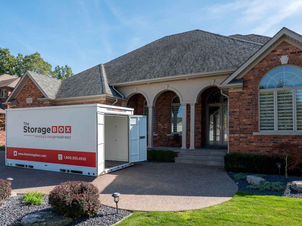 storage-box-shoot-4-5-42 Portable storage unit on driveway of a suburban house, ideal for easy moving and storage solutions. | Sky Rye Design Portable storage unit on driveway of a suburban house, ideal for easy moving and storage solutions.