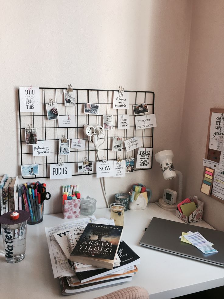 study motivation_ Organized study desk with motivational grid wall, books, laptop, and colorful stationery for a productive workspace. | Sky Rye Design Organized study desk with motivational grid wall, books, laptop, and colorful stationery for a productive workspace.