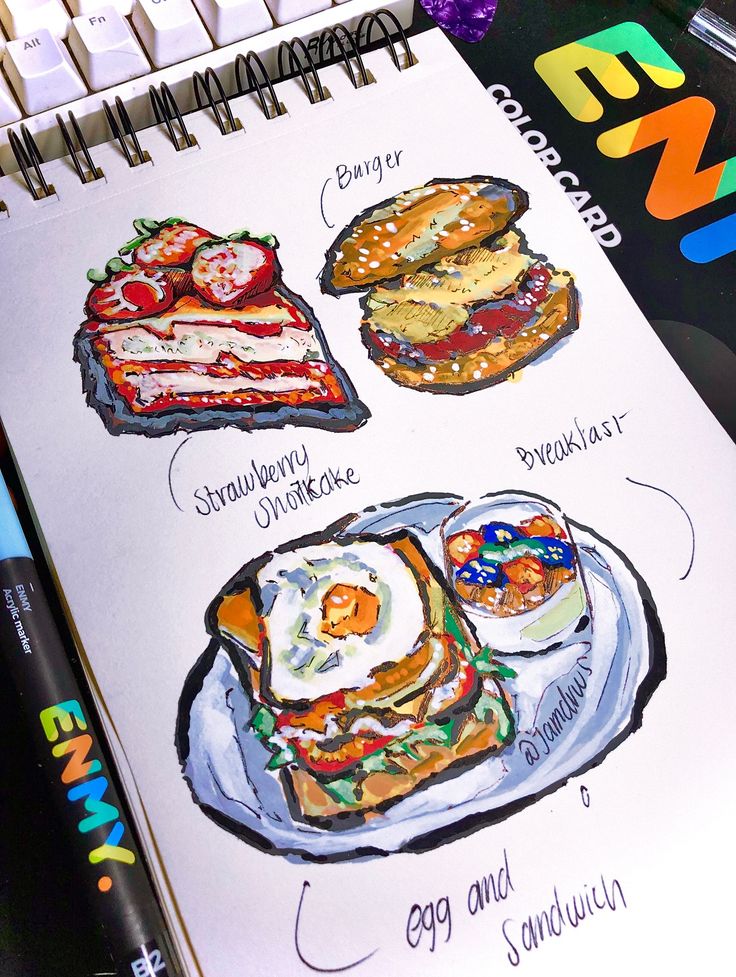 Illustrated food sketch featuring strawberry shortcake, a burger, and an egg sandwich on a notebook page.