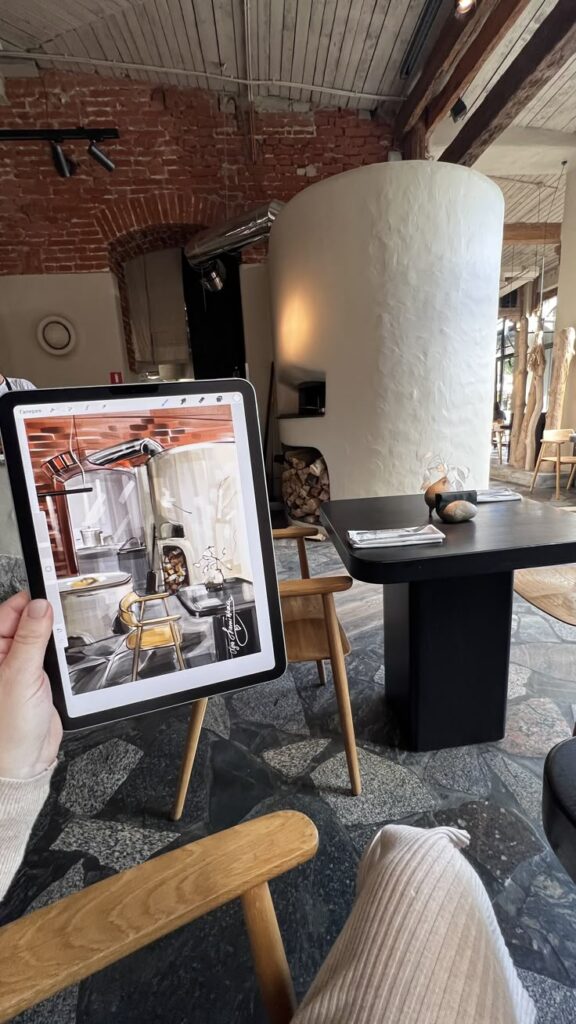 уфкпмфукпмф Tablet displaying a digital painting in a rustic cafe setting with wooden furniture and exposed brick walls. | Sky Rye Design Tablet displaying a digital painting in a rustic cafe setting with wooden furniture and exposed brick walls.