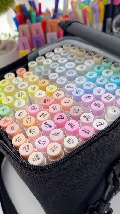 ♥️♥️ Colorful markers neatly organized in a black case, showcasing a variety of pastel shades for creative design projects. | Sky Rye Design Colorful markers neatly organized in a black case, showcasing a variety of pastel shades for creative design projects.