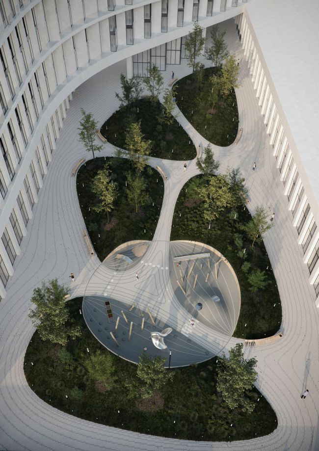 Modern building courtyard with green landscaping, unique curved pathways, and a central architectural structure.