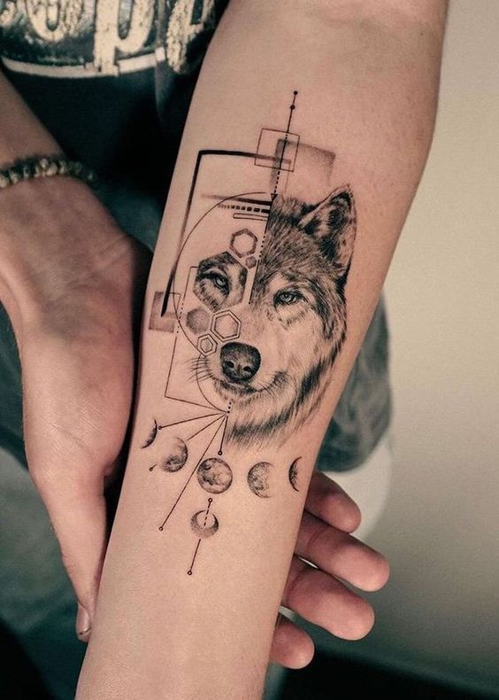 10+ Tattoo Ideas for Men with Meaning_ Ink that Tells Story Abstract wolf and moon phases tattoo on forearm, blending geometry with nature. | Sky Rye Design Abstract wolf and moon phases tattoo on forearm, blending geometry with nature.