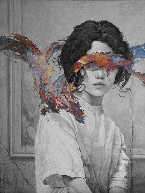 Surreal art portrait of a person with abstract colorful brushstrokes overlaying their face, blending creativity and mystery in grayscale.