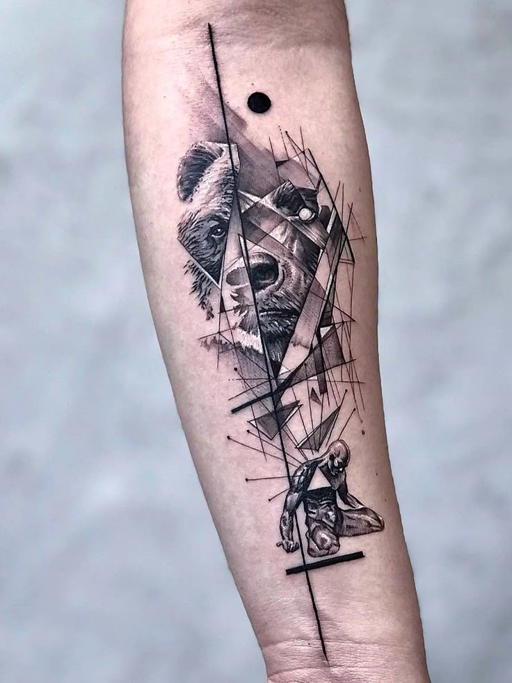 _ 13 Abstract tattoo design with geometric shapes, featuring a bear and a crouching figure on a forearm. | Sky Rye Design Abstract tattoo design with geometric shapes, featuring a bear and a crouching figure on a forearm.