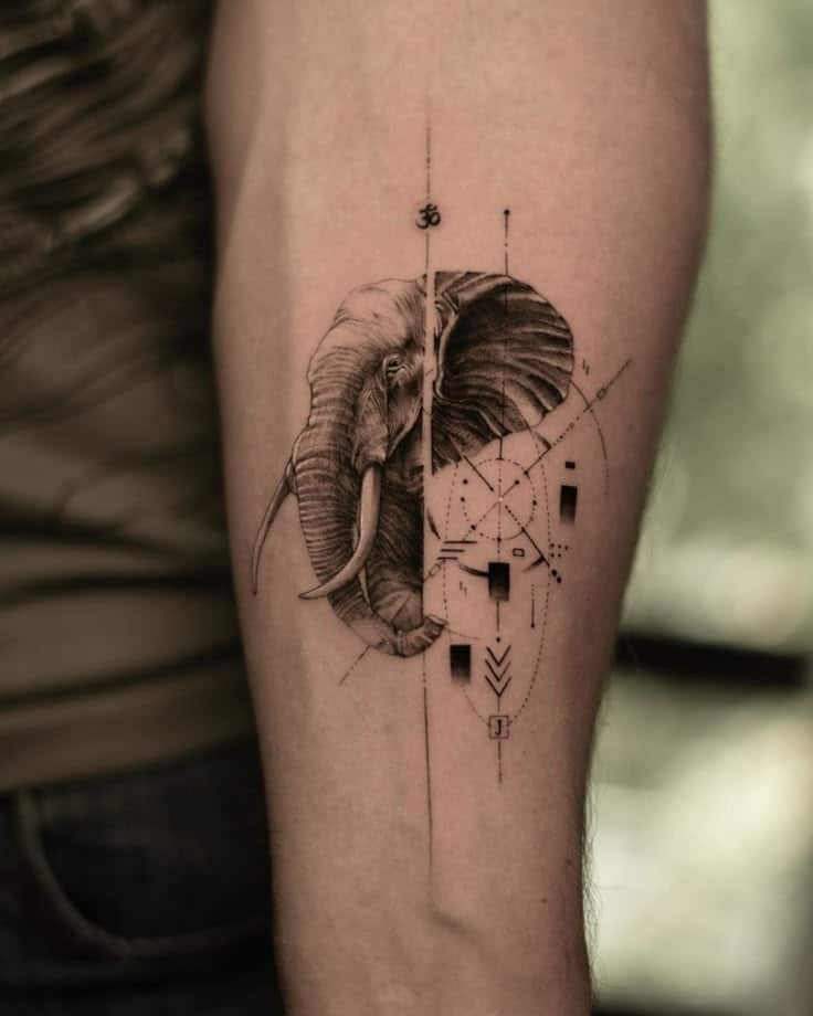 _ 15 Geometric elephant tattoo on forearm with intricate lines and abstract elements. | Sky Rye Design Geometric elephant tattoo on forearm with intricate lines and abstract elements.