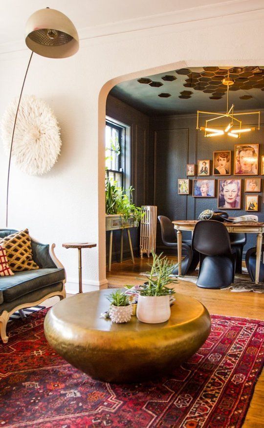 _ 15 Stylish living room with eclectic decor, bold art, colorful rug, and cozy seating area. | Sky Rye Design Stylish living room with eclectic decor, bold art, colorful rug, and cozy seating area.