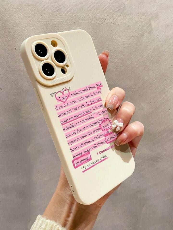 _ 18 Person holding a phone with a case featuring a love quote, highlighting positive values in a stylish and meaningful accessory design. | Sky Rye Design Person holding a phone with a case featuring a love quote, highlighting positive values in a stylish and meaningful accessory design.