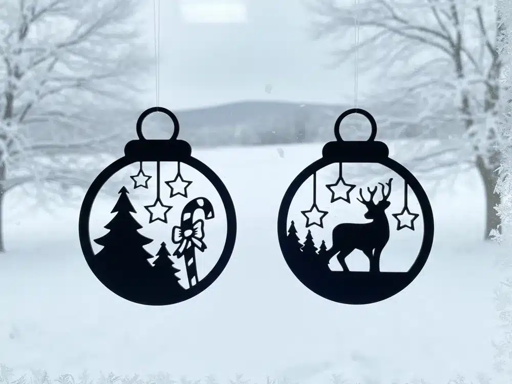 2025-11-09_2e77648c306498 Silhouette of Christmas ornaments on a snowy window, featuring a reindeer, trees, and candy cane, with snowy landscape and trees in background. | Sky Rye Design Silhouette of Christmas ornaments on a snowy window, featuring a reindeer, trees, and candy cane, with snowy landscape and trees in background.
