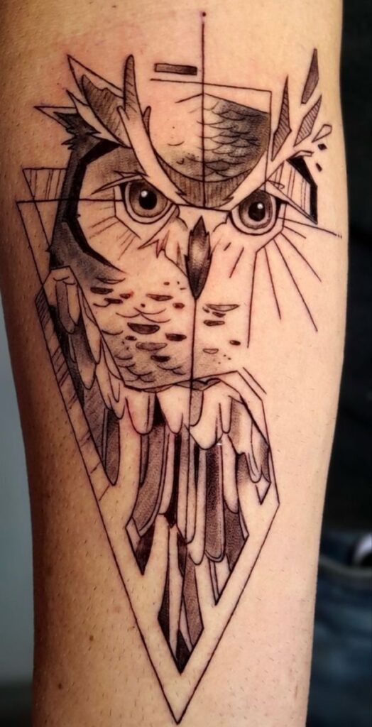 _ 21 Geometric owl tattoo with intricate lines and shading on forearm. | Sky Rye Design Geometric owl tattoo with intricate lines and shading on forearm.