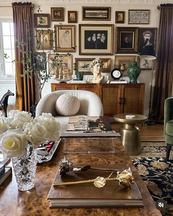 _ 25 Elegant living room with eclectic art, plush chair, ornate table, and flower arrangement for a cozy, stylish atmosphere. | Sky Rye Design Elegant living room with eclectic art, plush chair, ornate table, and flower arrangement for a cozy, stylish atmosphere.