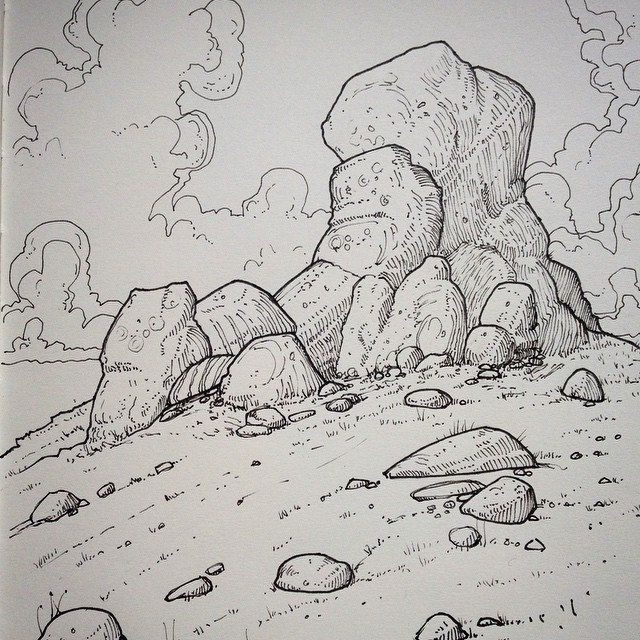 Ink sketch of a rocky landscape with large boulders and scattered stones under a cloud-filled sky, capturing a serene natural scene.
