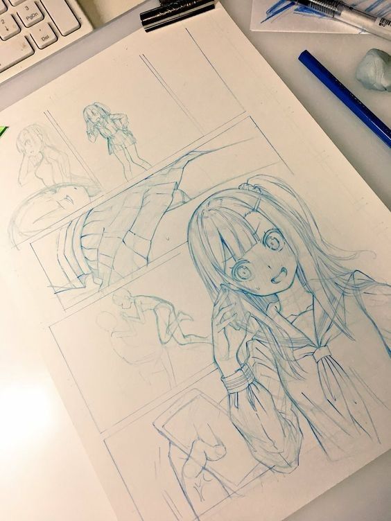 Manga storyboard sketch with a schoolgirl character holding a phone, surrounded by art tools and a keyboard.