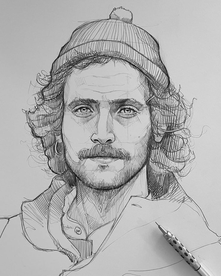 30 Self Portrait Drawing Ideas to Express Yourself Like Never Before - Drawyager Detailed sketch of a man with curly hair, wearing a beanie, next to a mechanical pencil on paper. | Sky Rye Design Detailed sketch of a man with curly hair, wearing a beanie, next to a mechanical pencil on paper.