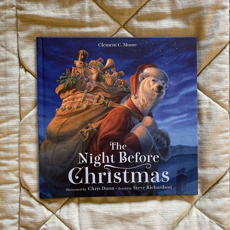 Cover of The Night Before Christmas, featuring a bear in a Santa outfit carrying a sack of toys, under a starry night sky.