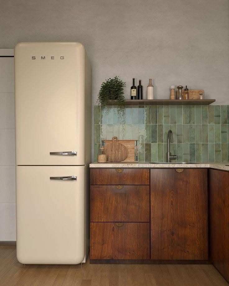 _ 5 Retro-style kitchen with cream SMEG fridge, green tiled backsplash, and wooden cabinets for a vintage, cozy look. | Sky Rye Design Retro-style kitchen with cream SMEG fridge, green tiled backsplash, and wooden cabinets for a vintage, cozy look.