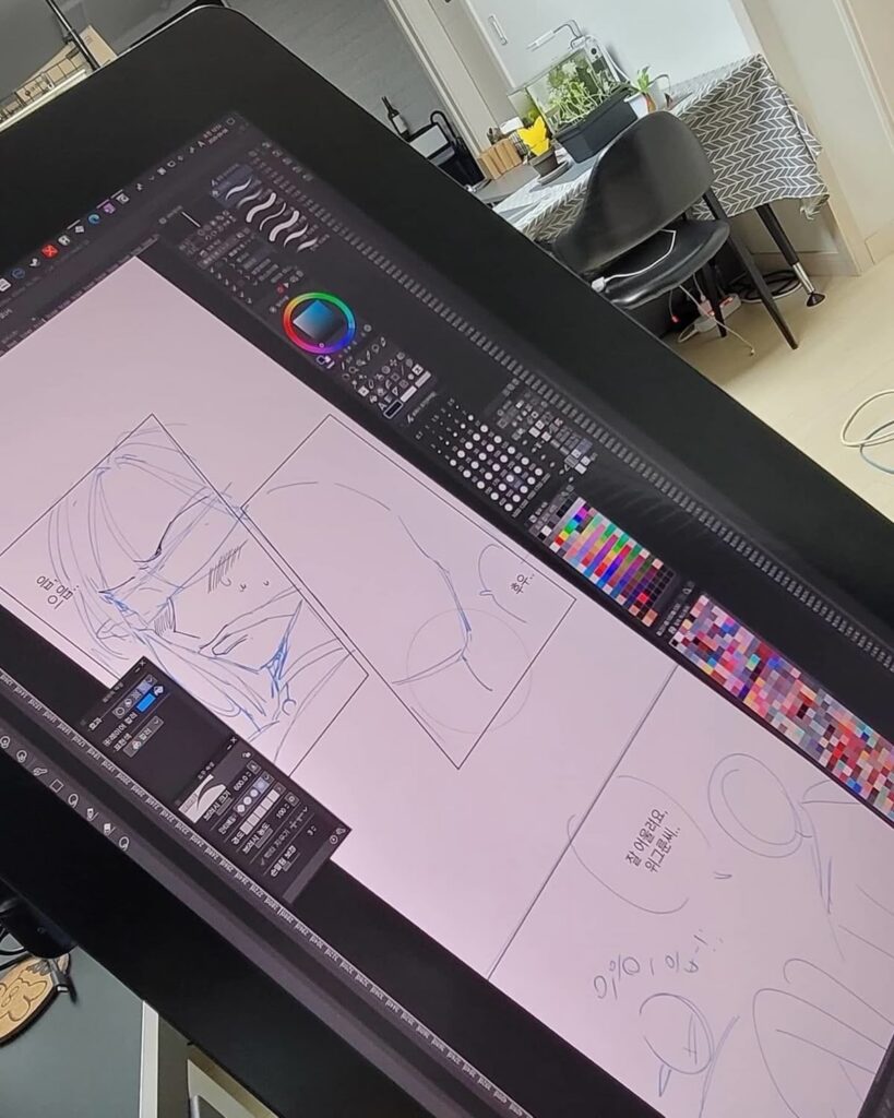 Digital art workstation displaying a sketch in progress on a tablet screen, with art tools and colors visible; modern creative workspace.