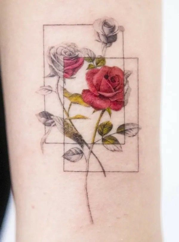 Artistic tattoo of a red rose interlaced with geometric lines on forearm, blending realism with modern design elements.