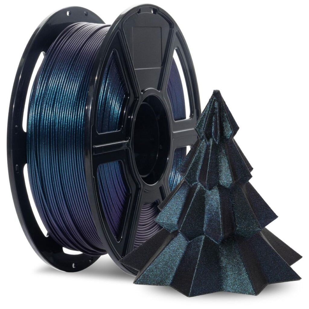 3D printer filament spool in metallic blue beside a geometric 3D-printed Christmas tree ornament. Ideal for holiday crafting.