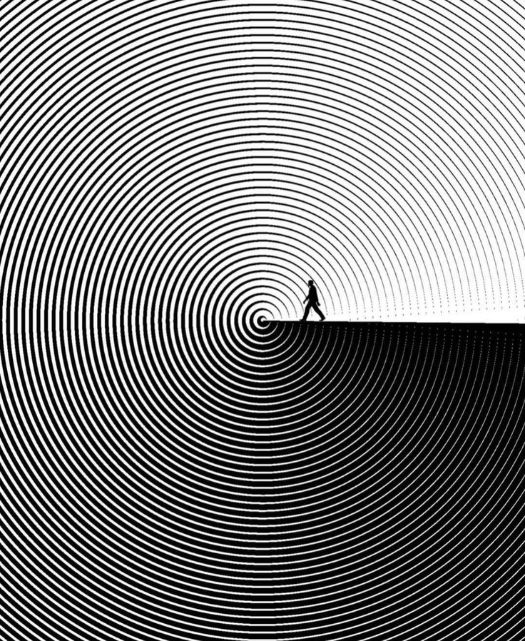 Silhouette of person walking on spiral-patterned surface, creating a striking optical illusion in black and white.