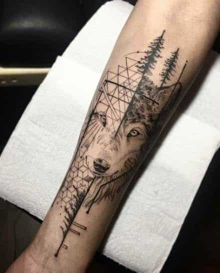 _ 8 Geometric wolf tattoo on forearm with trees and mountain. Black ink intricate design on light skin. | Sky Rye Design Geometric wolf tattoo on forearm with trees and mountain. Black ink intricate design on light skin.