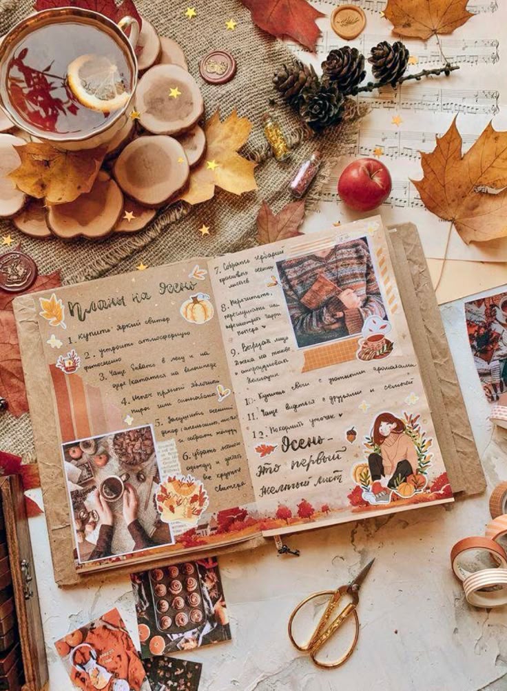 Cozy autumn journal spread with warm tea, colorful leaves, pinecones, and notes. Seasonal ambiance with a creative, rustic touch.