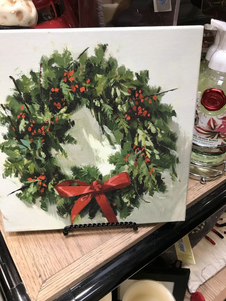 95bbaca1-9210-40d8-a7ce-390fd19086a2 Festive wreath painting with red berries and bow on display. Perfect holiday decor for a cozy, seasonal ambiance. | Sky Rye Design Festive wreath painting with red berries and bow on display. Perfect holiday decor for a cozy, seasonal ambiance.