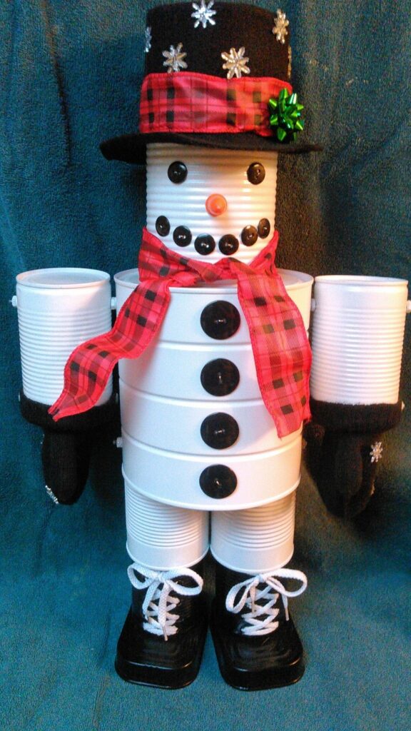 9795675effbcfb2e5b462b2ccd12d7be DIY snowman craft made from tin cans and buttons, decorated with a plaid scarf and hat, festive home decor idea for Christmas. | Sky Rye Design DIY snowman craft made from tin cans and buttons, decorated with a plaid scarf and hat, festive home decor idea for Christmas.