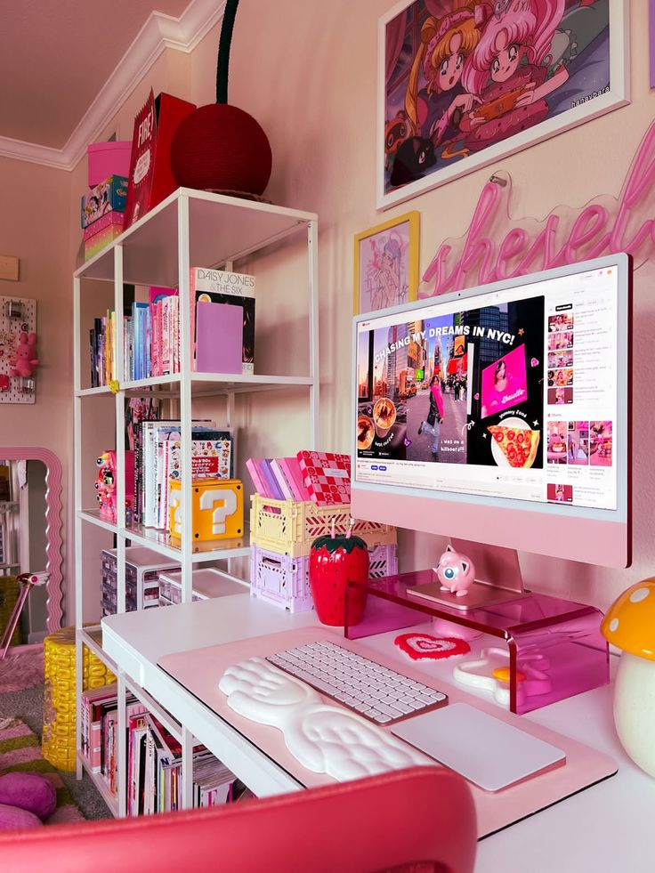9d6ab2d6-1586-4a00-9ff5-bb649671eccc Cute and colorful desk setup with books, a pink computer, and playful decorations, perfect for creating a cozy and inspiring workspace. | Sky Rye Design Cute and colorful desk setup with books, a pink computer, and playful decorations, perfect for creating a cozy and inspiring workspace.