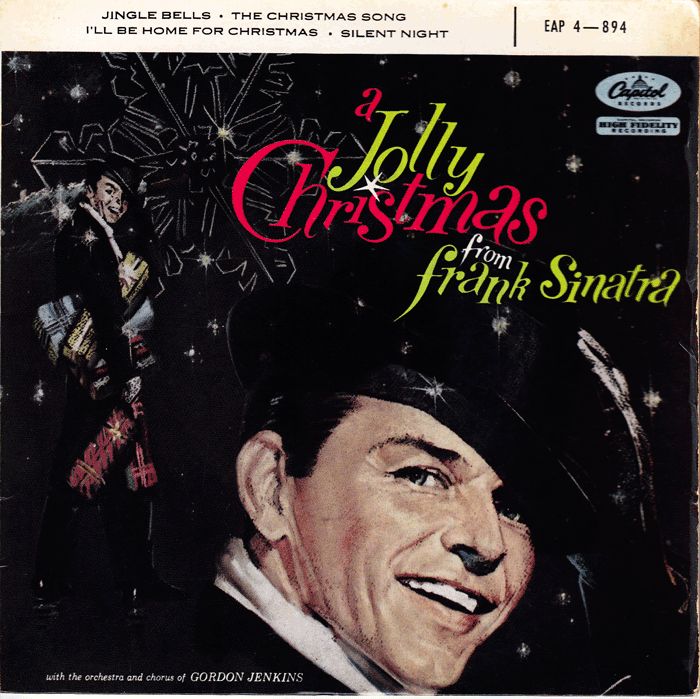 A Jolly Christmas from Frank Sinatra_ 1957 Album cover of A Jolly Christmas featuring a smiling man in a hat with festive decorations. | Sky Rye Design Album cover of A Jolly Christmas featuring a smiling man in a hat with festive decorations.