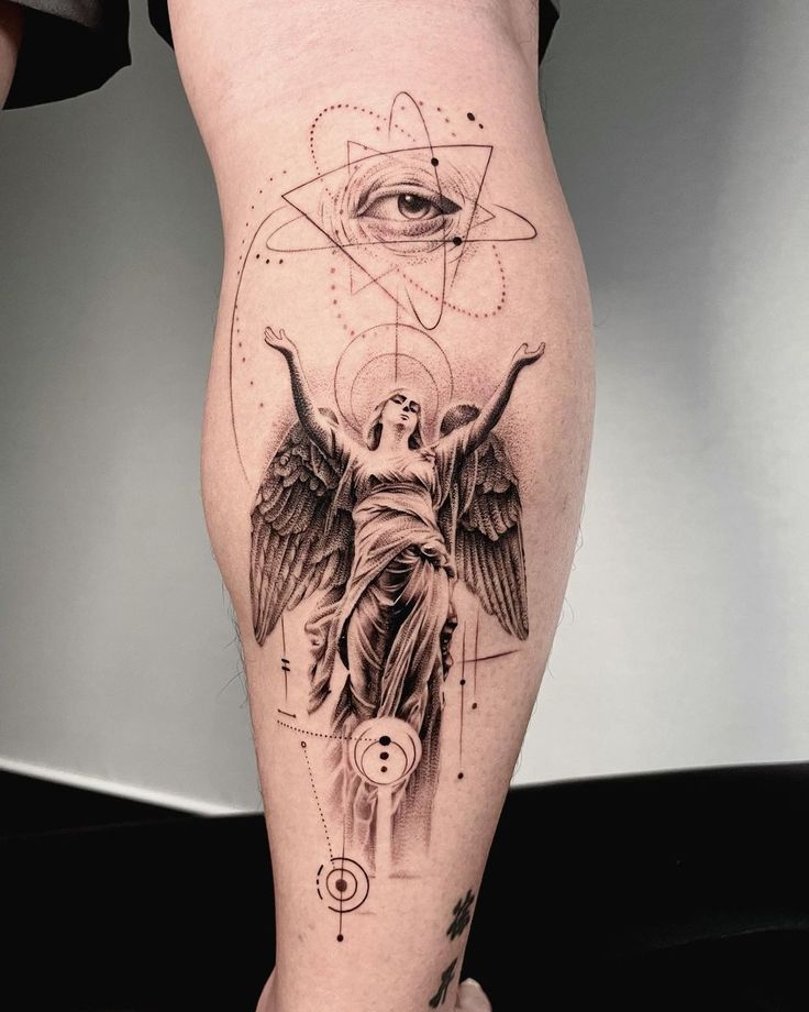 Anjo olho Geometric tattoo on calf with angel, eye, and abstract designs, blending celestial and mystical elements. | Sky Rye Design Geometric tattoo on calf with angel, eye, and abstract designs, blending celestial and mystical elements.