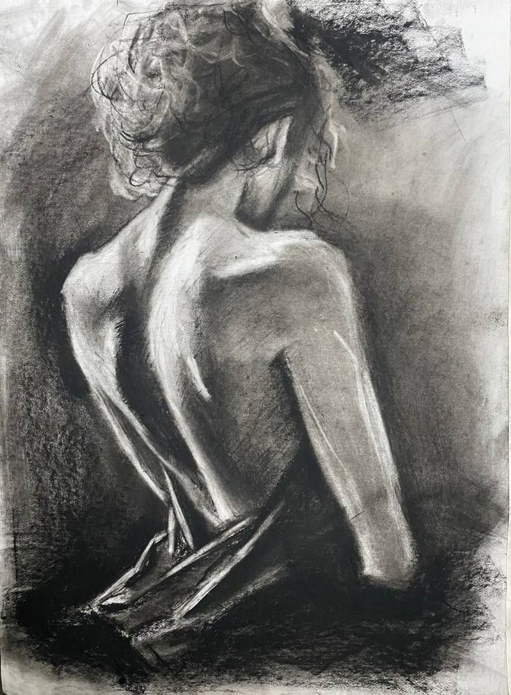 Charcoal sketch of a woman from behind, showcasing intricate hair details and a graceful pose, highlighting artistic shadow play.