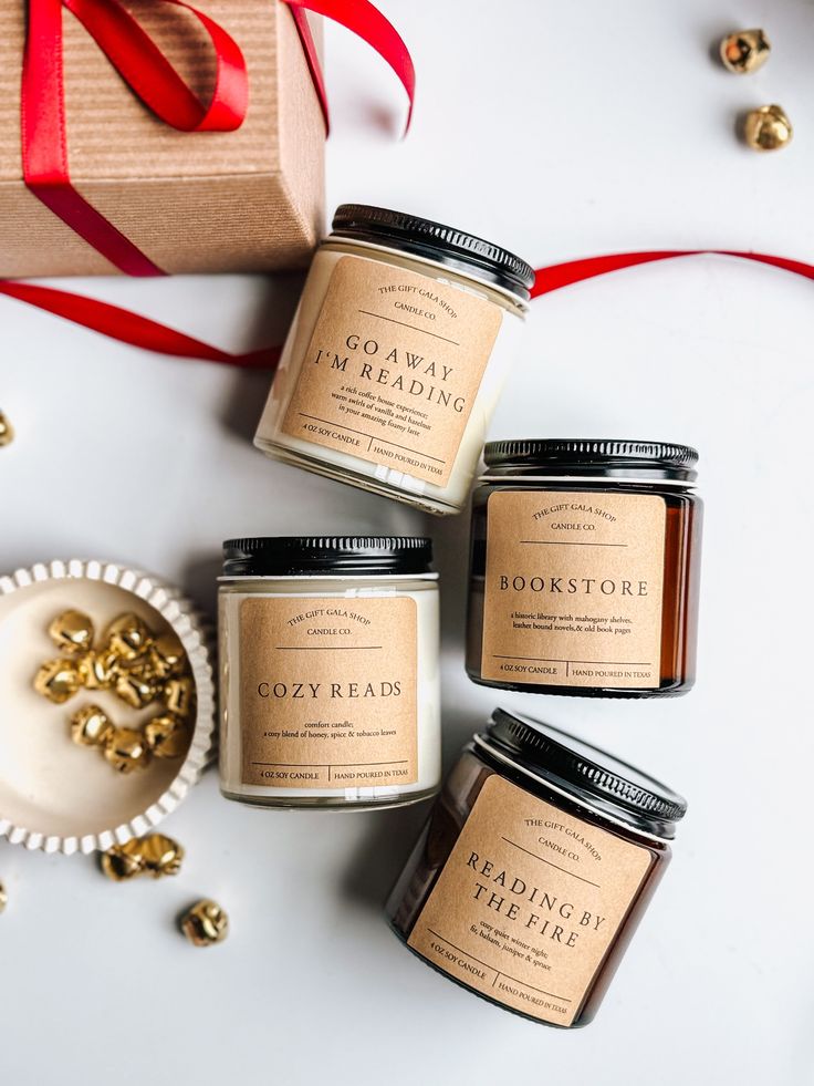 Book Lover Candle Gift Set _ Candle Set of 4 _ Bookish Gift for Christmas _ Handmade Scented Candles - Candles Only Candles with book-themed labels: Go Away, I'm Reading, Cozy Reads, Bookstore, and Reading by the Fire, next to a gift box. | Sky Rye Design Candles with book-themed labels: Go Away, I'm Reading, Cozy Reads, Bookstore, and Reading by the Fire, next to a gift box.