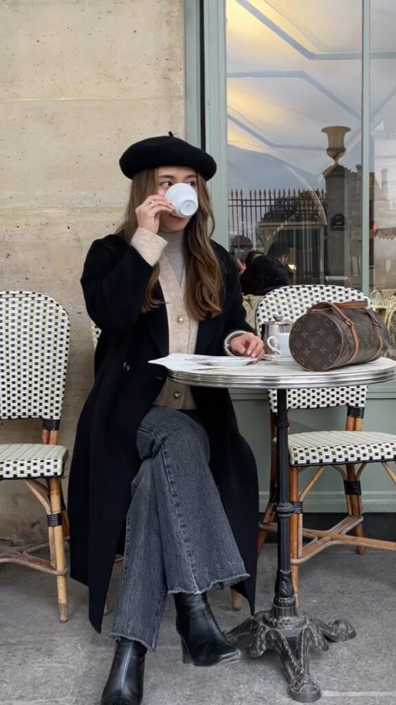 Coffee dates in paris Stylish woman in a beret enjoying coffee at a Parisian café, with an elegant coat and designer bag on a classic bistro chair. | Sky Rye Design Stylish woman in a beret enjoying coffee at a Parisian café, with an elegant coat and designer bag on a classic bistro chair.