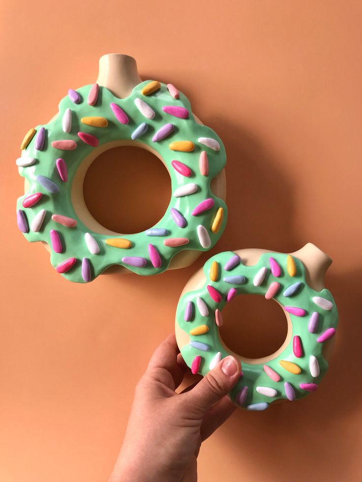 Donut Vase_ Doughnut Vase_ Cute Decor_ Colorful Home Decor_ Sprinkles Icing Frosting Frosted Donut Vases_ Quirky Kawaii Food Decorations - Etsy Colorful donut-shaped dog toys with sprinkles on a peach background, one held by a hand. | Sky Rye Design Colorful donut-shaped dog toys with sprinkles on a peach background, one held by a hand.