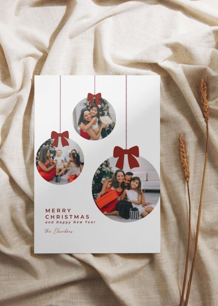 Festive holiday card with family photos in ornament shapes, featuring Merry Christmas and Happy New Year message on a fabric background.