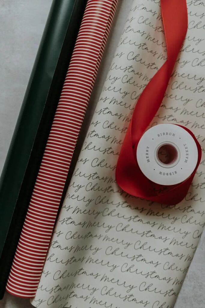 Favorite Holiday Gift Wrap - christmas - decor hint Christmas wrapping papers in green stripes, red patterns, and Merry Christmas script with red ribbon, ideal for festive gift wrapping. | Sky Rye Design Christmas wrapping papers in green stripes, red patterns, and Merry Christmas script with red ribbon, ideal for festive gift wrapping.