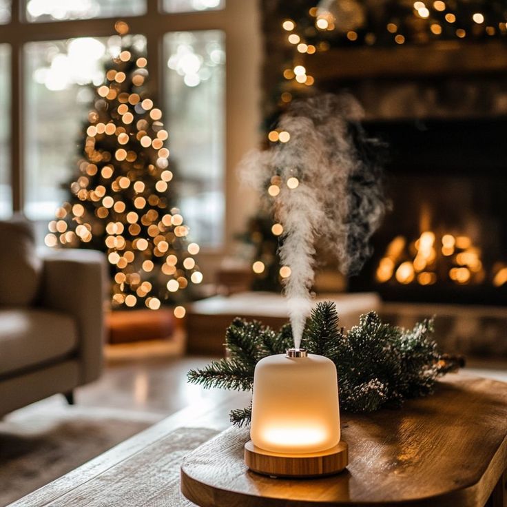 Festive Essential Oil Blends for Christmas Cheer Cozy living room with a glowing essential oil diffuser, Christmas tree, and fireplace, creating a warm holiday atmosphere. | Sky Rye Design Cozy living room with a glowing essential oil diffuser, Christmas tree, and fireplace, creating a warm holiday atmosphere.