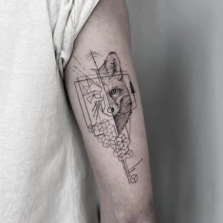Fox tattoo Geometric fox tattoo on arm showcasing intricate line and hexagon designs. Monochrome ink art. | Sky Rye Design Geometric fox tattoo on arm showcasing intricate line and hexagon designs. Monochrome ink art.