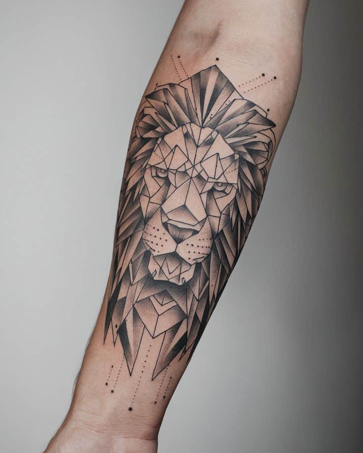 Geometric Animal Fusion Tattoos That Combine Beauty and Power Geometric lion tattoo on forearm, featuring intricate linework and dot patterns on skin. | Sky Rye Design Geometric lion tattoo on forearm, featuring intricate linework and dot patterns on skin.