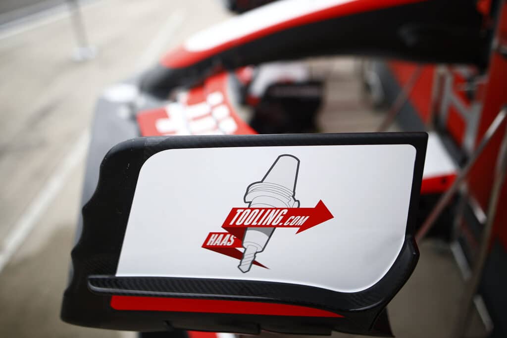 Formula 1 2022 Emilia Romagna GP Haas F1 rear wing with Tooling.com logo displayed, featuring red and black racing livery. | Sky Rye Design Haas F1 rear wing with Tooling.com logo displayed, featuring red and black racing livery.