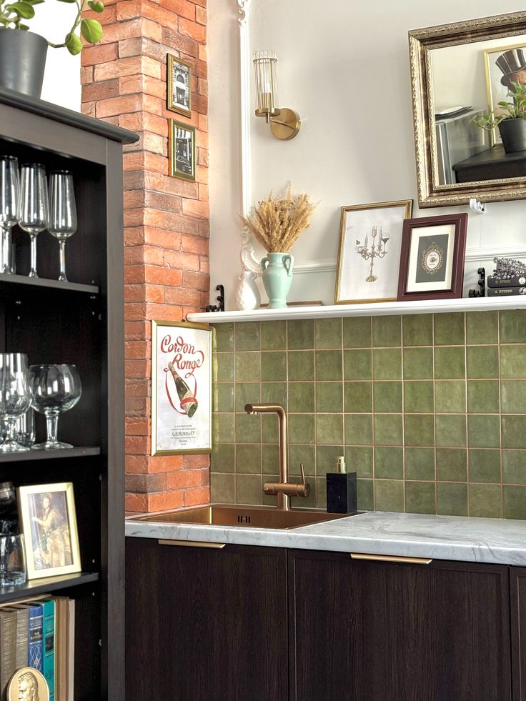 Kitchen ❤️ Modern kitchen with green tile backsplash, copper faucet, and decorative shelving. | Sky Rye Design Modern kitchen with green tile backsplash, copper faucet, and decorative shelving.