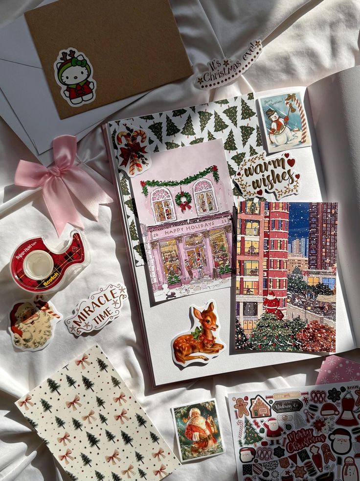 Festive holiday cards, stickers, and wrapping supplies create a cozy Christmas-themed flat lay, perfect for spreading seasonal joy.
