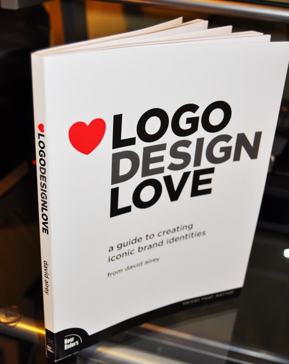 Book cover of 'Logo Design Love' by David Airey, a guide on creating iconic brand identities with a heart logo on white background.