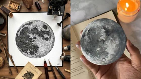 Lunar Art Learn How to Draw a Moon Crater Like a Pro Moon art illustration with vintage tools on a table and a hand holding a realistic moon model, next to an open book and candle. | Sky Rye Design Moon art illustration with vintage tools on a table and a hand holding a realistic moon model, next to an open book and candle.