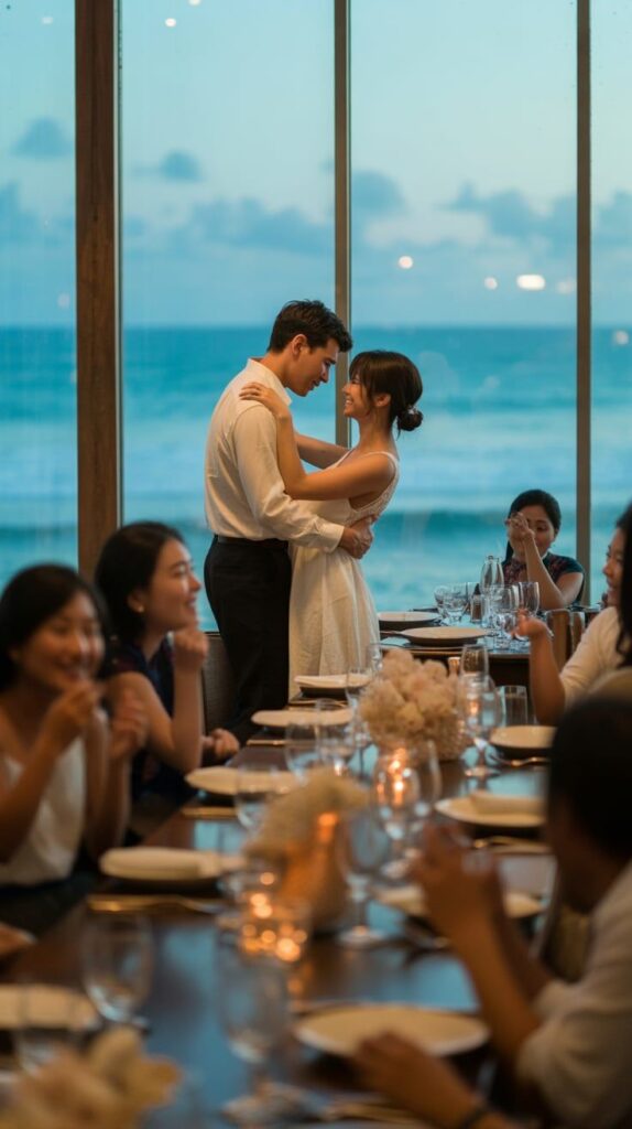 McLoones Pier House Long Branch 11 Best Affordable Beach Wedding Venues To Suit Every Style Couple dances romantically at a seaside dinner party, surrounded by guests, candles, and ocean view through large windows. | Sky Rye Design Couple dances romantically at a seaside dinner party, surrounded by guests, candles, and ocean view through large windows.