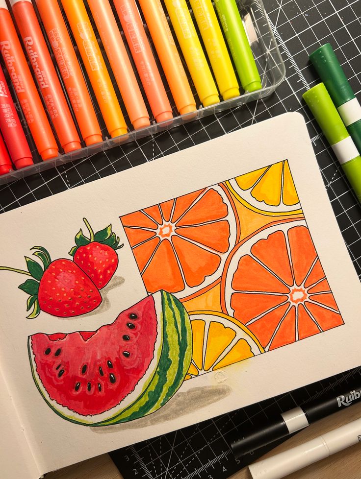 Fruit-inspired illustration with strawberries, watermelon, and orange slices, surrounded by colorful markers.