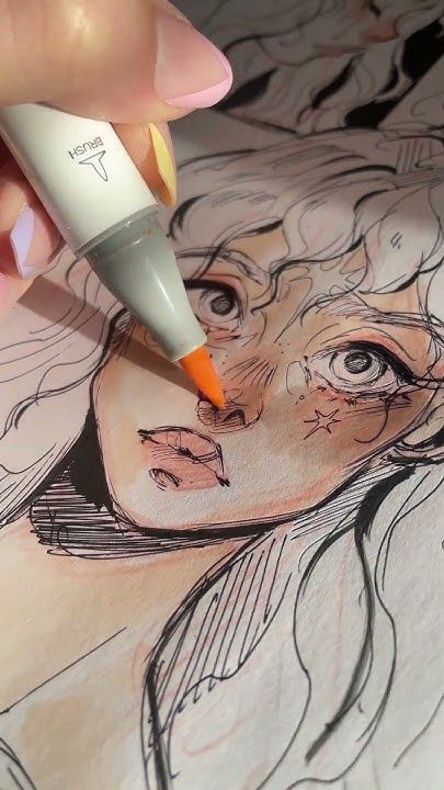 Painting with markers 🌿🌸🌙 Close-up of a hand using an orange marker on a detailed illustration of a woman's face, focusing on enhancing facial features. | Sky Rye Design Close-up of a hand using an orange marker on a detailed illustration of a woman's face, focusing on enhancing facial features.